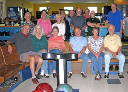 Bowling group relaxing.
